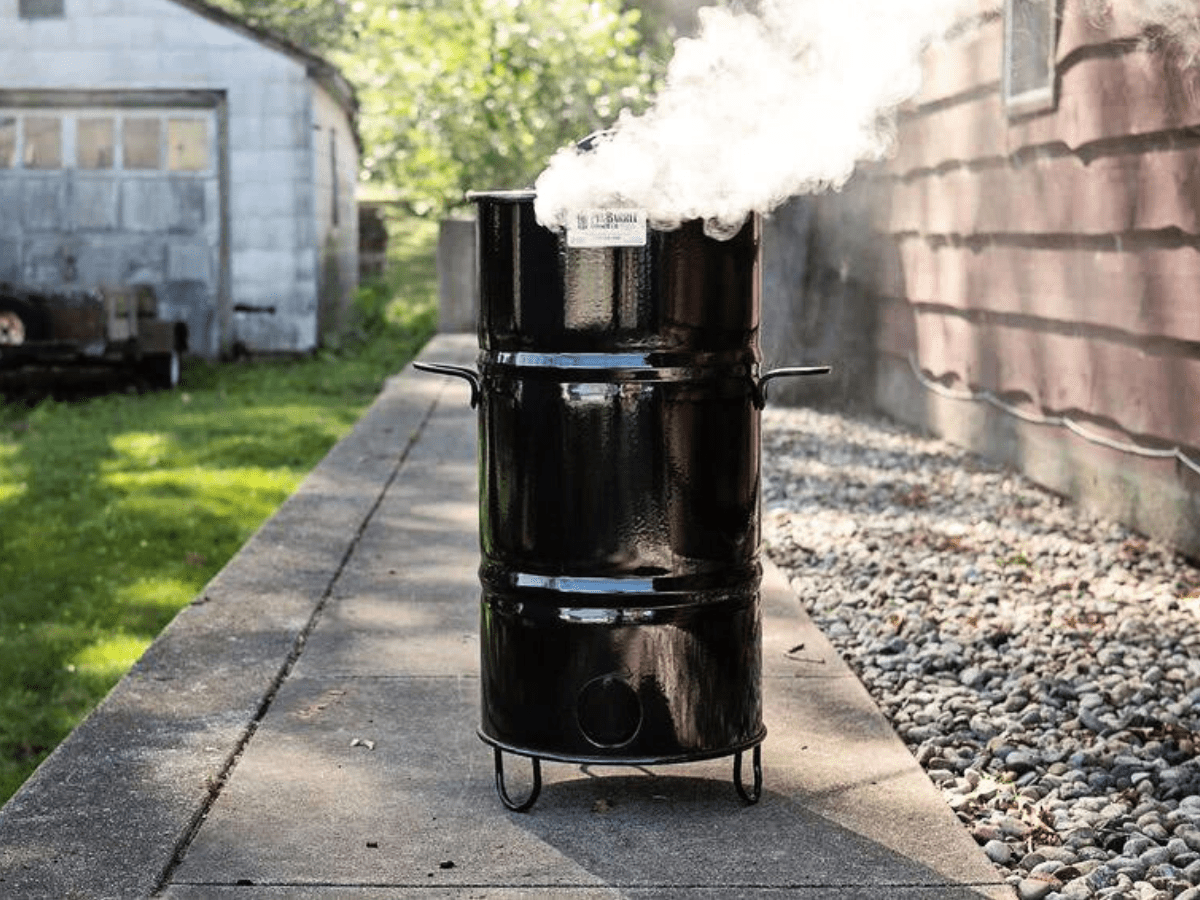 pit barrel cooker review on sidewalk